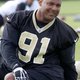 Will Smith, then No. 91 of the New Orleans Saints, stretching at the Saints training facility May 24, 2012, in Metairie, La.
Sean Gardner/Getty Images